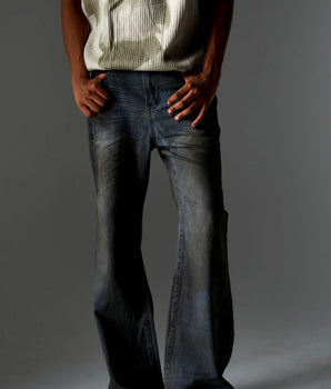 Distressed Vintage Flare Jeans with Worn Texture